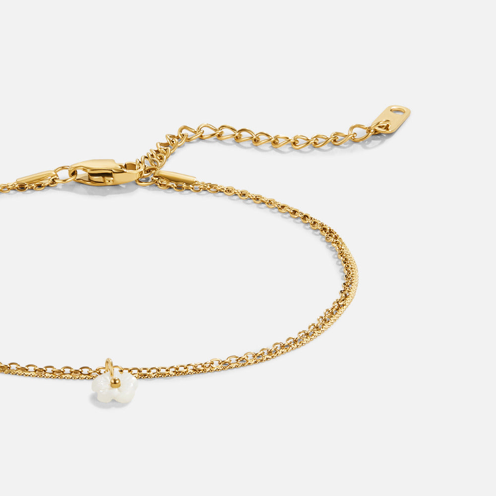 Bela cvetna školjka plastnata anklet