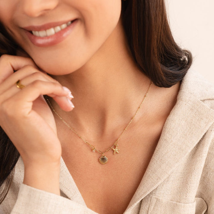 Zlata školjka in morska zvezda ogrlica